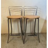 A pair of contemporary chrome bar stools, upholstered in faux beige leather (H94cm)