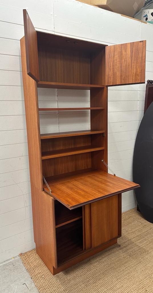 A G-Plan Mid Century bookcase bureau, two shelves and cupboard over a single shelf cupboard under (