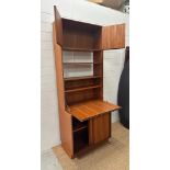 A G-Plan Mid Century bookcase bureau, two shelves and cupboard over a single shelf cupboard under (