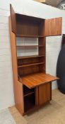 A G-Plan Mid Century bookcase bureau, two shelves and cupboard over a single shelf cupboard under (