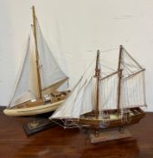 A model racing yacht and sail ship (34cm x 35cm)