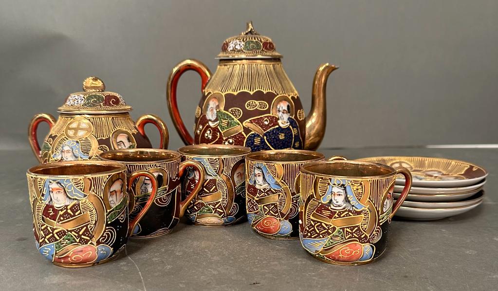 A Japanese satsuma style tea service depicting the immortals