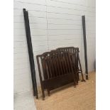 A pair of Edwardian mahogany single bed frame on castor