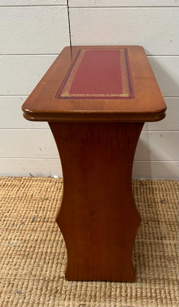 A teak magazine rack with red leather top - Image 2 of 3