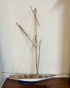 A wooden model of a yacht (H96cm W78cm)