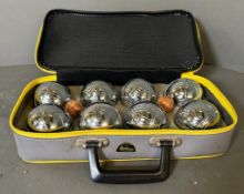 A cased Jaques of London Boule set. Eight balls and two jacks
