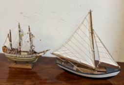Two model sailing boats (35cm x 35cm)