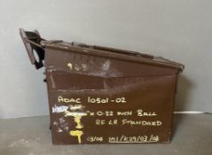 A brown metal military ammunition box