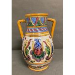 A Studio Pottery two handled vase with floral decoration