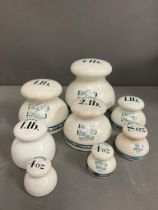 A selection of imperial ceramic weights marked W & T Avery