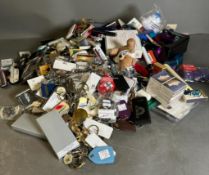 A large quantity of cruise liner collectables and ephemera to include key chains, bottle openers and