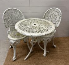 A white painted wrought iron garden bistro set. Table height 63. Diameter 69