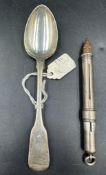 A silver teaspoon and silver pencil