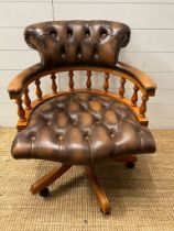 Chesterfield swivel captain chair