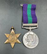A General Service medal with Cyprus Bar 23274070 CPL.P.D. McArthy R.SIGS along with a 1939-45 star.