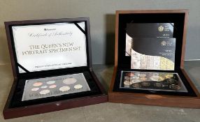 The Royal Mint 2011 United Kingdom Executive Proof Set and the Queen's New portrait Specimen set.