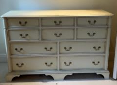 A Laura Ashley long chest of drawers on bracket feet (H93cm W143cm D48cm)