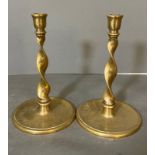 A Pair of Georgian brass twisted candlesticks Height 24cm