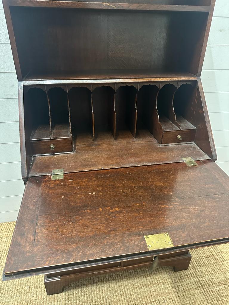 An oak bookcase bureau with single cupboard and single drawer and two shelf over (H157cm W74cm - Image 2 of 5