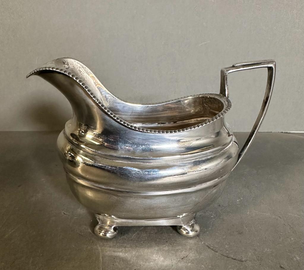 A three piece hallmarked silver tea set to include teapot, milk jug and sugar bowl (Approximate - Image 2 of 5