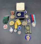 A selection of various medals and medallions.