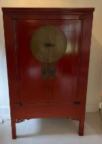 A Chinese red lacquer wedding cabinet (H172cm W102cm D65cm)