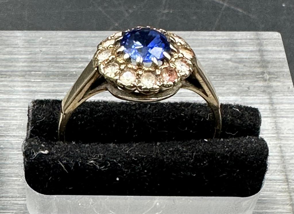 A 9ct gold ring with central blue stone and seed pearls AF (Approximate total weight 2.5g)