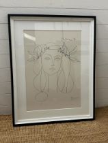 A framed print of Picasso's "War and Peace" 50cm x 70cm