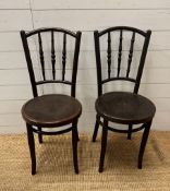 A pair of vintage Bentwood bistro chairs