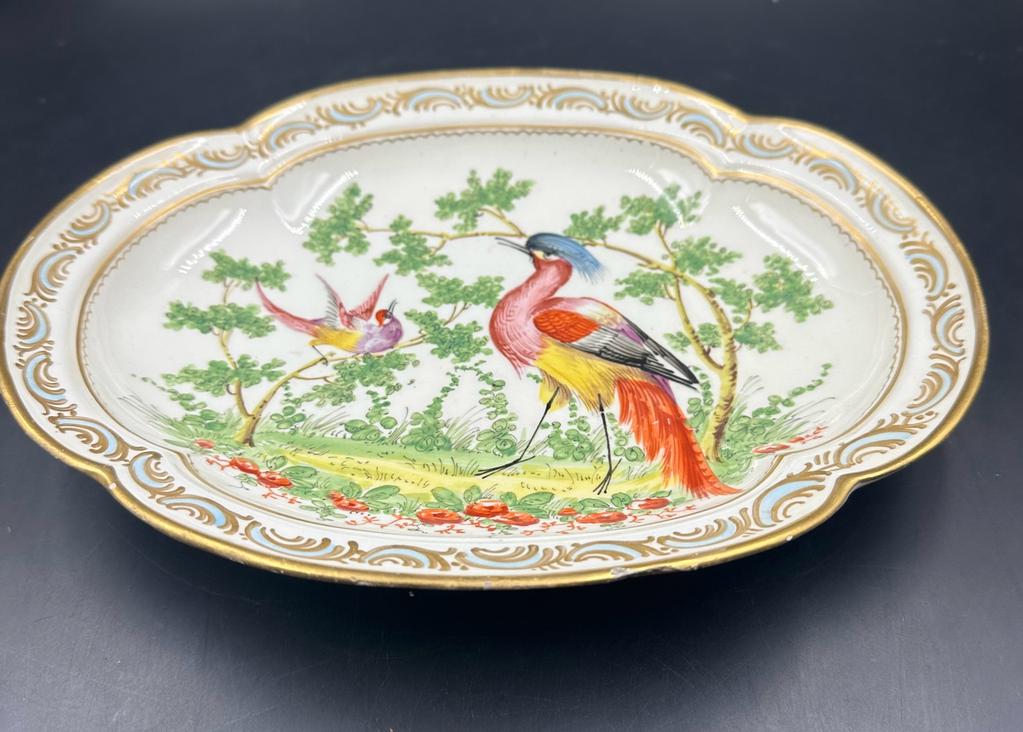 A French hard paste hand painted faux Chelsea dish