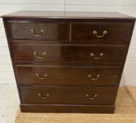 A mahogany two over three chest of drawers with brass drop handles (H105cm W106cm D47cm)