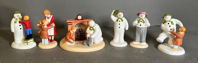 A selection of six Coalport "The Snowman" figures to include "Adding A Smile", "Hugs For Mum" and "