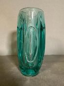 A Rosice Turquoise glass "lens" vase by Rudolf Schrotter. Height 20cm