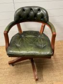 A R.M office/captain chair with aged green leather