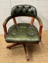 A R.M office/captain chair with aged green leather