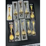 Georg Jensen, seven modern Danish silver-gilt and enamel year spoons,1972, 1974-79 the terminals