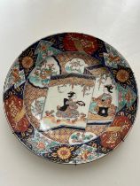 An Imari platter depicting tea serving
