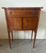 An Edwardian style yew string inlaid work box on raised legs with compartments to top and cupboard