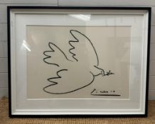 A framed print of Picasso's "Dove of Peace" 50cm x 68cm