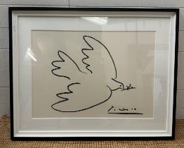 A framed print of Picasso's "Dove of Peace" 50cm x 68cm