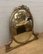A large gilt framed oval over mantel mirror in Coco style AF (H117cm W121cm)