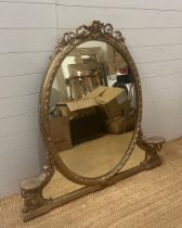 A large gilt framed oval over mantel mirror in Coco style AF (H117cm W121cm)