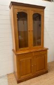 A Stuart Linford dresser with glazed doors sat upon a two drawers and cupboard ( 207 H cm x 47 D x