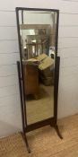 A mahogany free standing full length dressing mirror on splayed feet (H149cm)