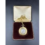 An 18ct gold Longines 16 Jewels pocket watch on an 18ct fancy link chain, marked 750 505mm in