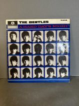 A vinyl copy of The Beatles "A Hard Days Night" ref XEX481