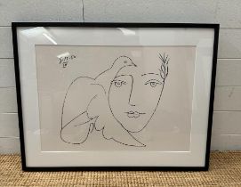 A framed print of Picassos "The Face of Peace" 45cm x 64cm