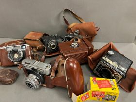 A selection of box brownies and other camera including Yaashika and Volgtlander