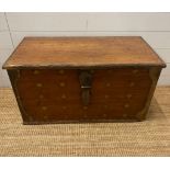 An oak 19th Century Indonesia brass banded blanket box with brass drop handles (H44cm W83cm D43cm)