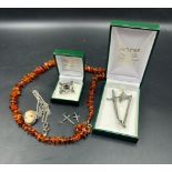 A small selection of costume jewellery including some silver items.